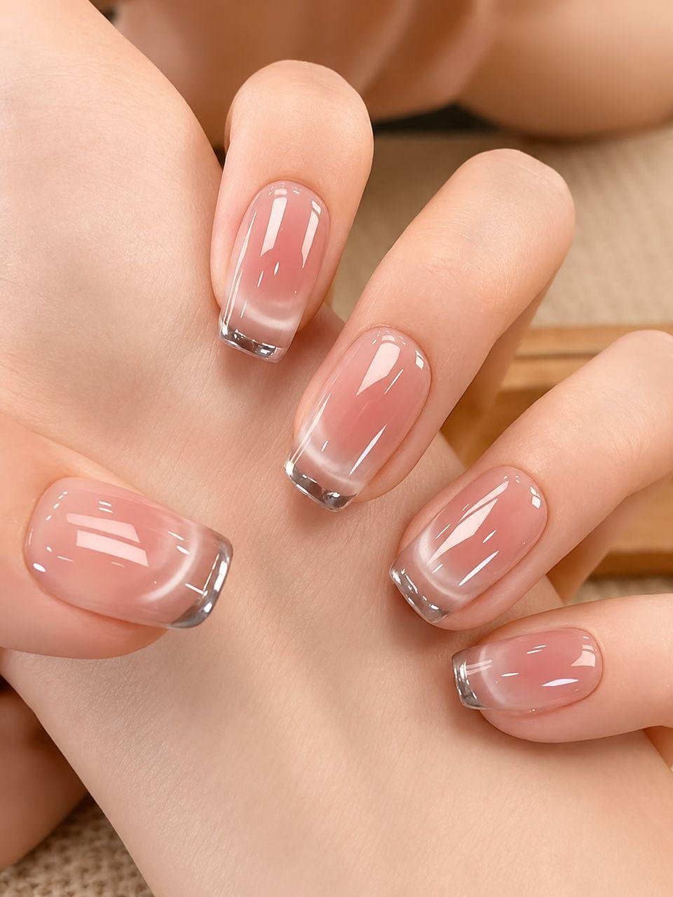 Glazed pink gel manicure with chrome silver French tips at Passionate Nails, Great World