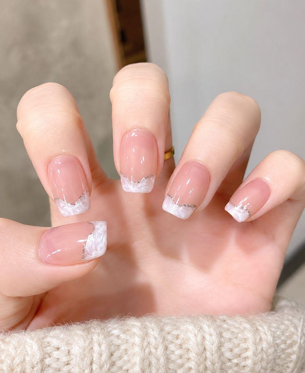 White marble French nail extensions with silver glitter lining at Passionate Nails, Great World